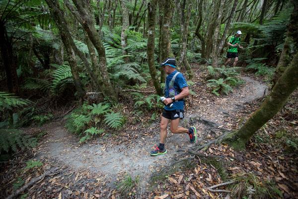 Runners in natural New Zealand forest in the 2013 Vibram Tarawera Ultramarathon